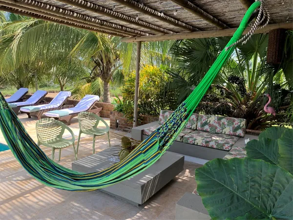 a view of swimming pool from a balcony