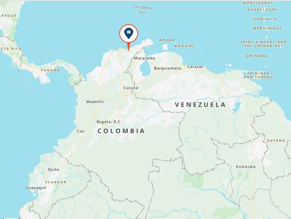 a close up of a white wall with a vase of flowers