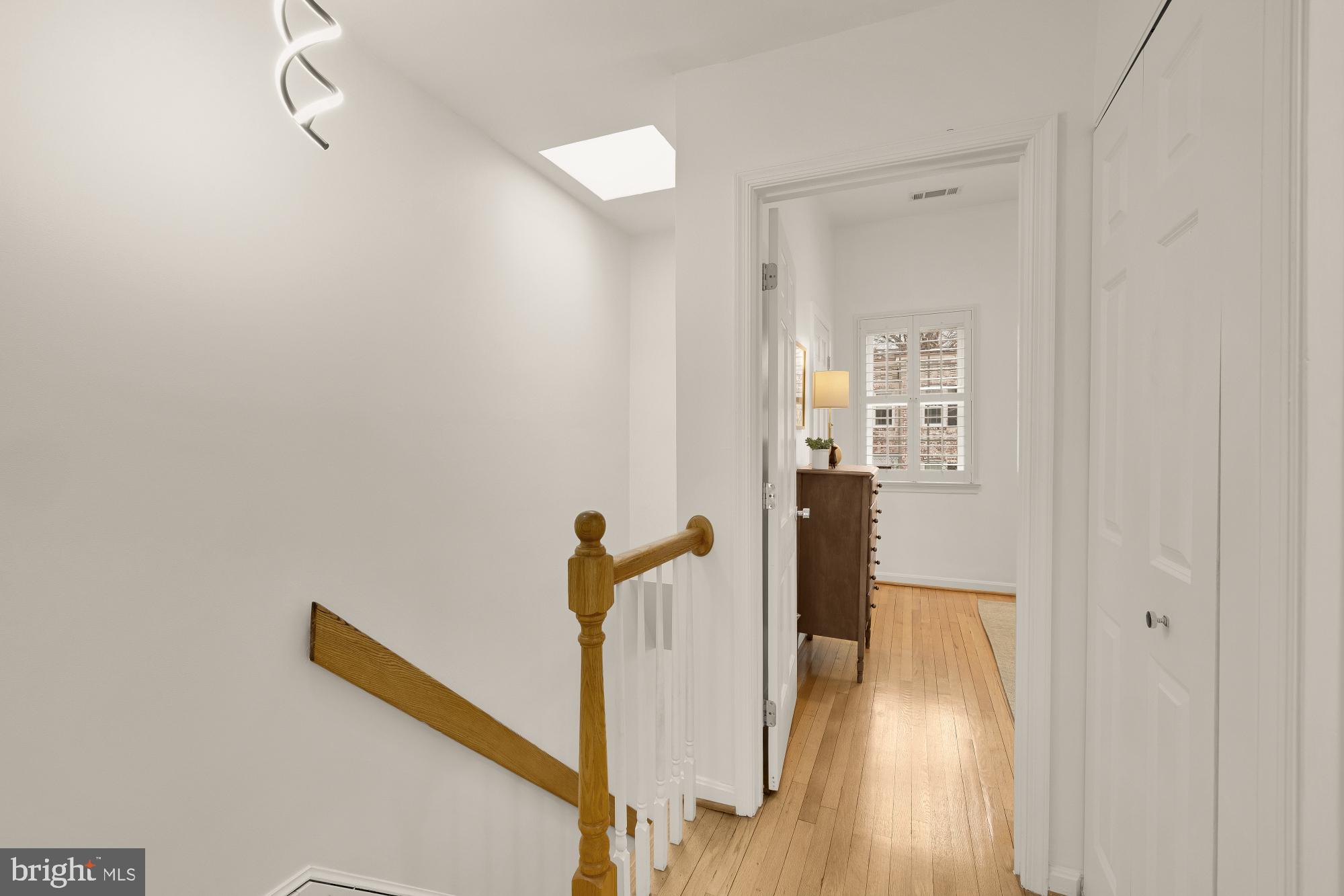 2808 Olive Street Northwest Washington, DC 20007 - Photo 14 of 37 Upper level landing features skylight