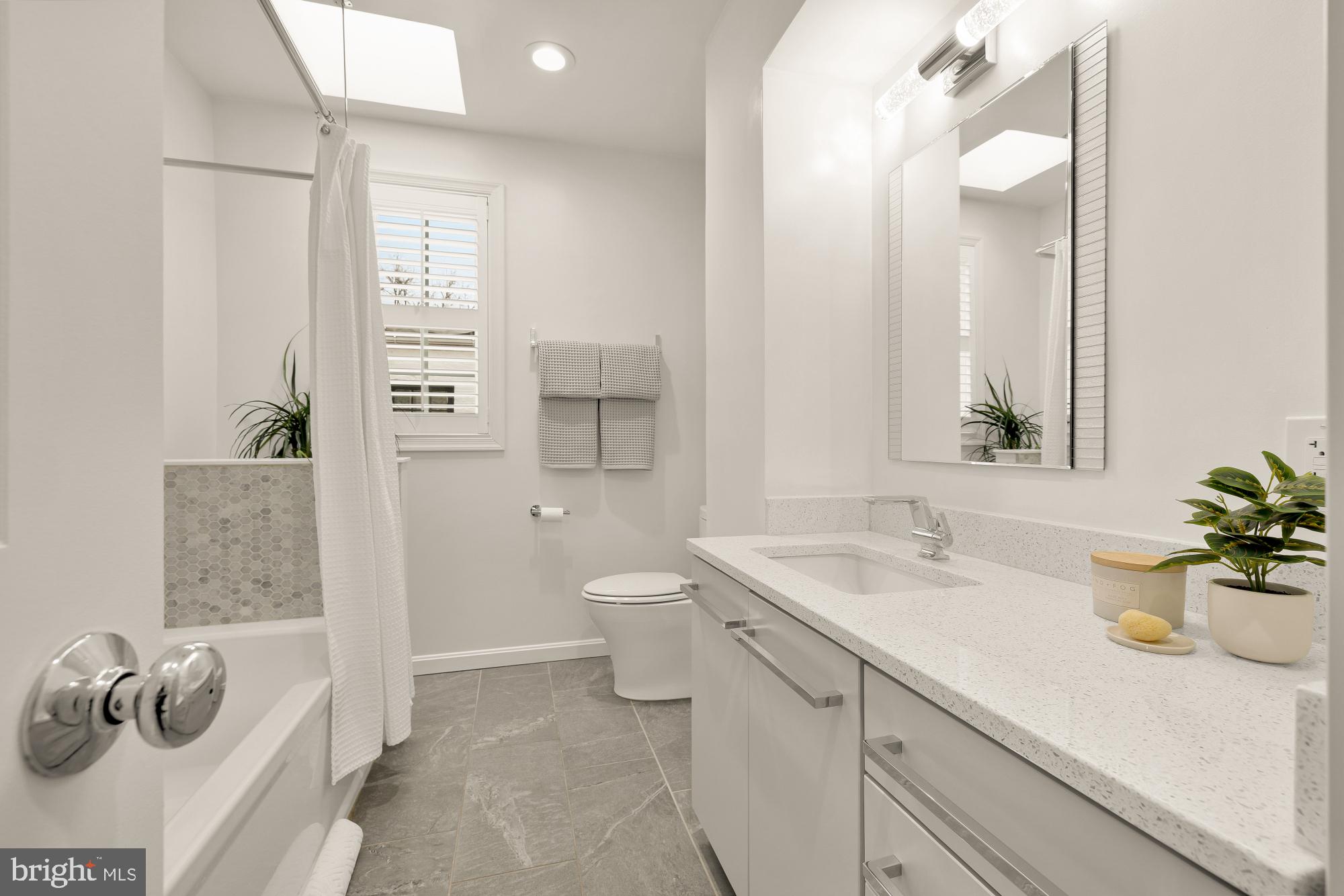 2808 Olive Street Northwest Washington, DC 20007 - Photo 21 of 37 Upper level full bath with heated floors