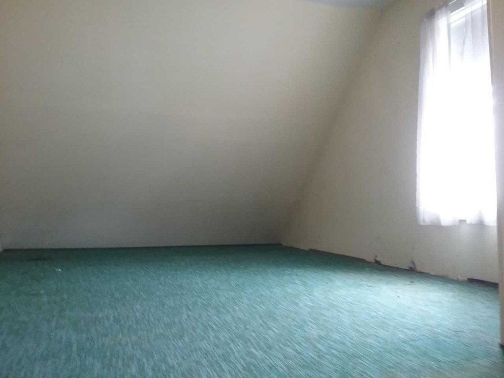 65 Prospect Street Wellesley, MA 02481 - Photo 11 of 25 an empty room with a window
