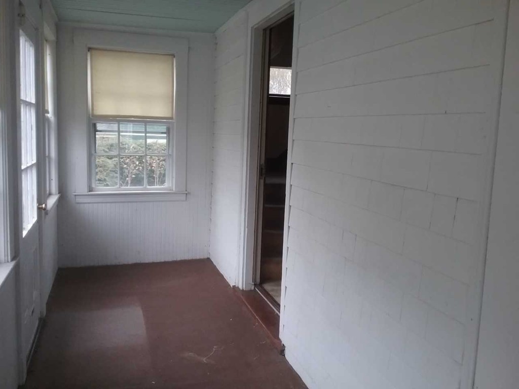 65 Prospect Street Wellesley, MA 02481 - Photo 3 of 25 an empty room with windows