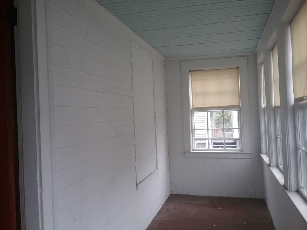65 Prospect Street Wellesley, MA 02481 - Photo 4 of 25 a view of an empty room with a window