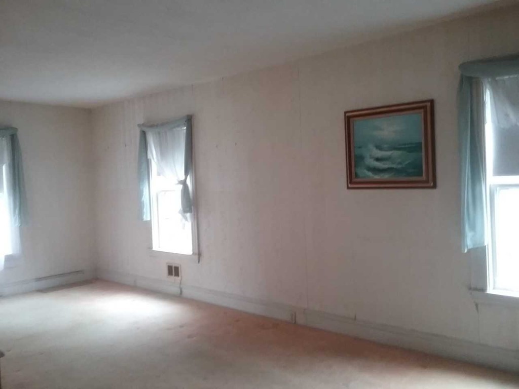 65 Prospect Street Wellesley, MA 02481 - Photo 5 of 25 an empty room with a window