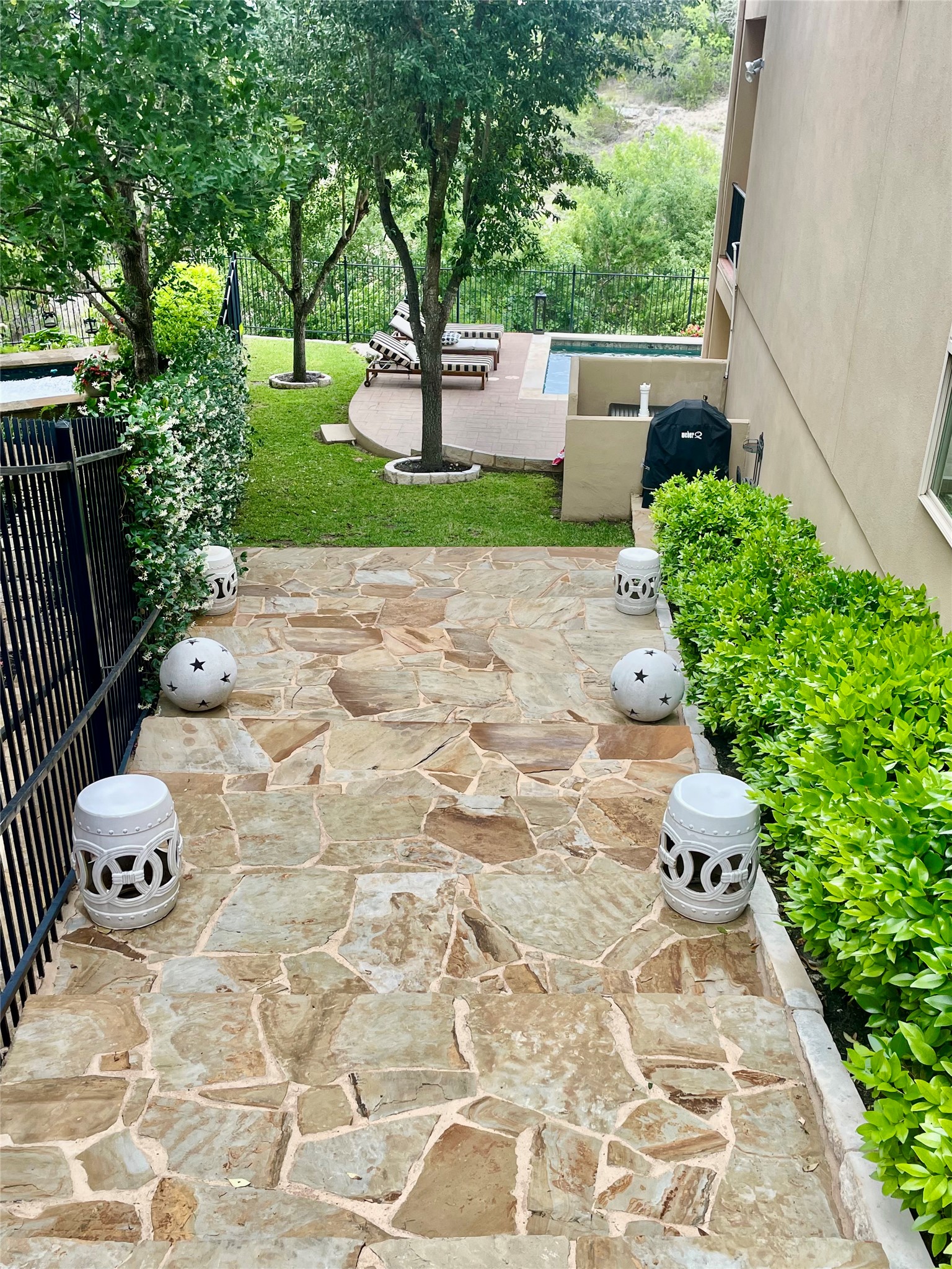 2312 Rivina Drive Austin, TX 78733 - Photo 11 of 40 Your guests can use these beautiful stone steps to reach the resort-like swimming pool.