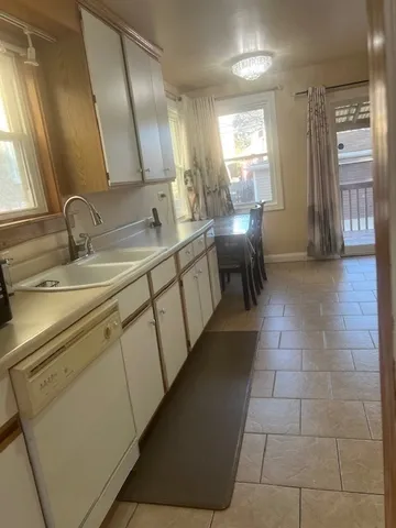 a bathroom with a sink and mirror