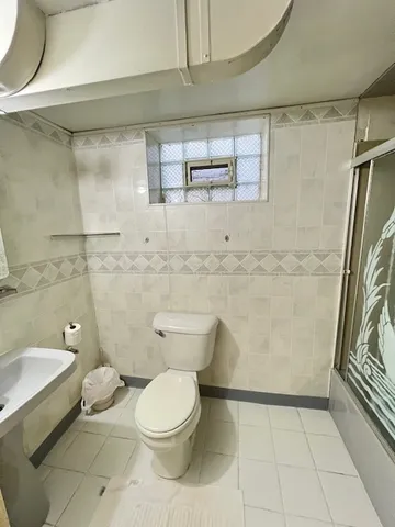 a view of a living room with a large window