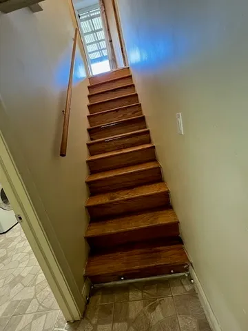 a view of balcony with wooden floor