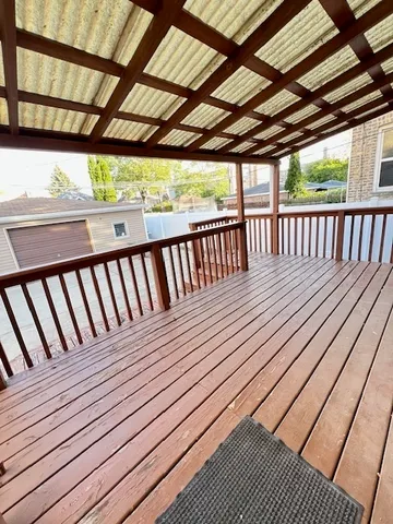 a view of a backyard with sitting area