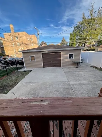 a view of a house with backyard and porch