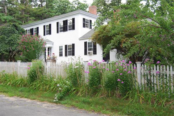 90 Nourse Road Ashby, MA 01431 - Photo 1 of 27 a house that has a lot of plants in it