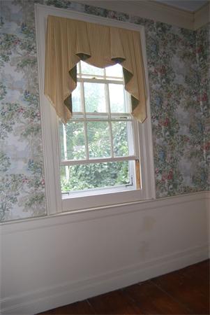90 Nourse Road Ashby, MA 01431 - Photo 13 of 27 a bathroom with a window sink and cabinets