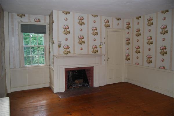 90 Nourse Road Ashby, MA 01431 - Photo 19 of 27 a view of a livingroom with wooden floor and a fireplace