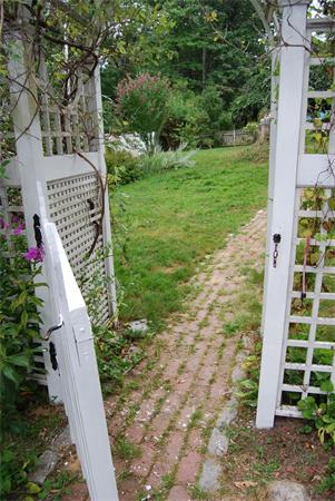 90 Nourse Road Ashby, MA 01431 - Photo 24 of 27 a view of a garden with pathway