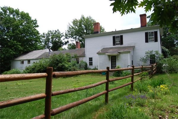 90 Nourse Road Ashby, MA 01431 - Photo 26 of 27 a view of a house with wooden fence and a yard