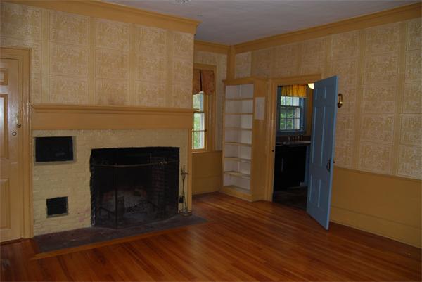 90 Nourse Road Ashby, MA 01431 - Photo 7 of 27 a view of a livingroom with a fireplace and a fireplace