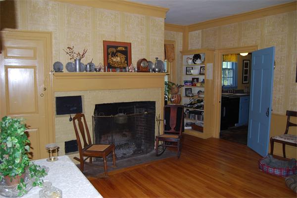 90 Nourse Road Ashby, MA 01431 - Photo 8 of 27 a living room with furniture and a fireplace