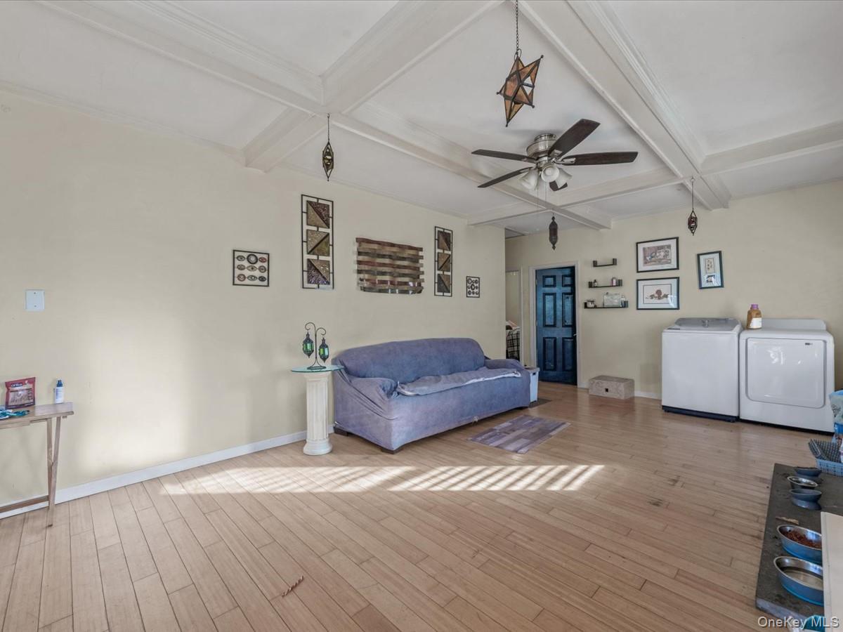 29 Parkside Avenue Miller Place, NY 11764 - Photo 3 of 14 a living room with furniture and wooden floor