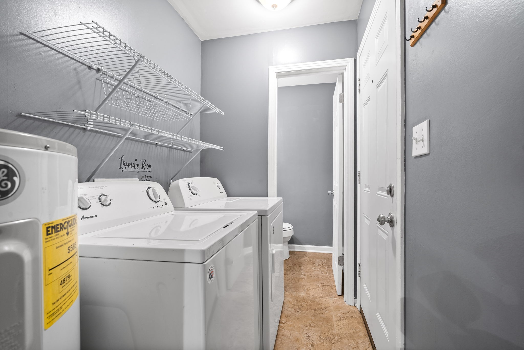 832 Pollard Road Clarksville, TN 37042 - Photo 14 of 30 a utility room with dryer and washer
