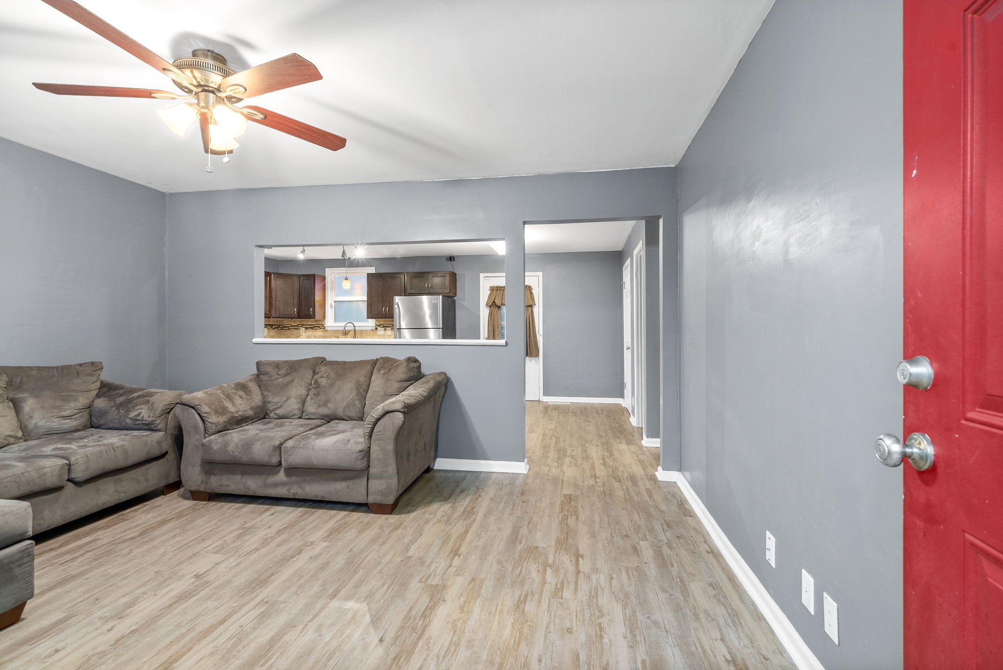 832 Pollard Road Clarksville, TN 37042 - Photo 3 of 30 a living room with furniture and a wooden floor