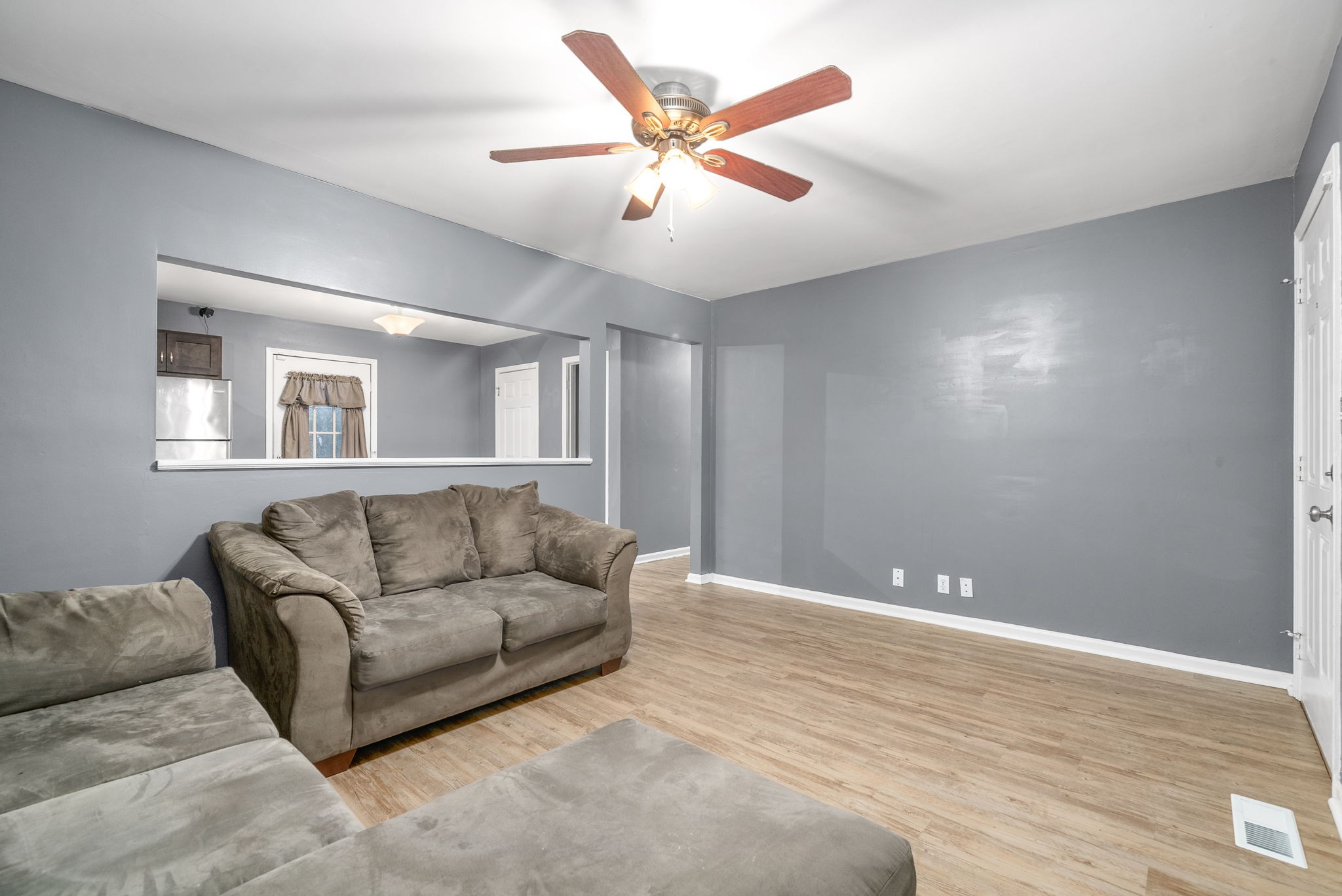 832 Pollard Road Clarksville, TN 37042 - Photo 5 of 30 a living room with furniture and ceiling fan