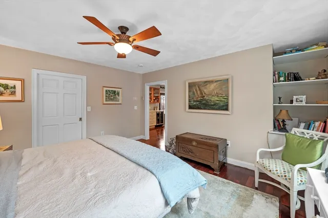 a bedroom with bed and furniture