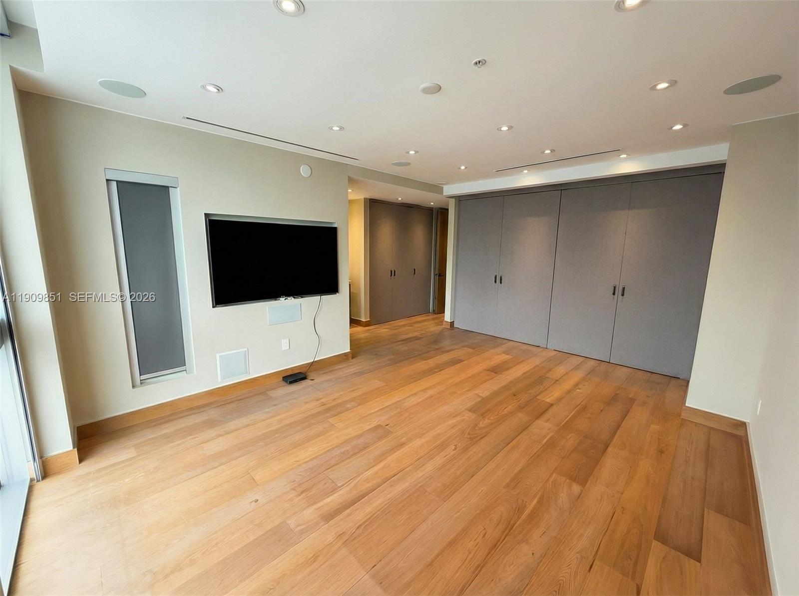 92 Southwest 3rd Street, Unit PH5213 Miami, FL 33130 - Photo 18 of 24 a view of a livingroom with a flat screen tv