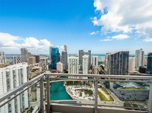 a view of swimming pool from a balcony