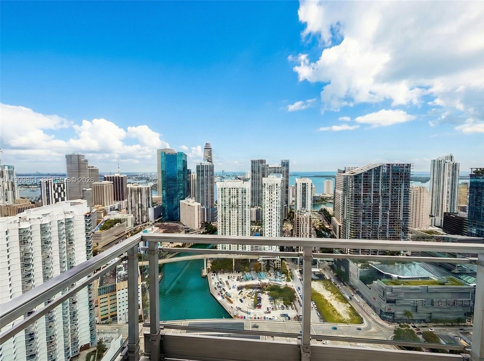 92 Southwest 3rd Street, Unit PH5213 Miami, FL 33130 - Photo 2 of 24 a view of swimming pool from a balcony