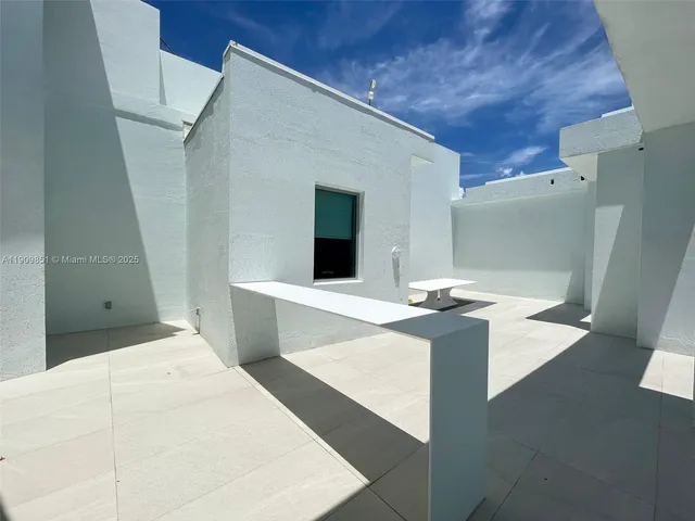 a view of a balcony with city view