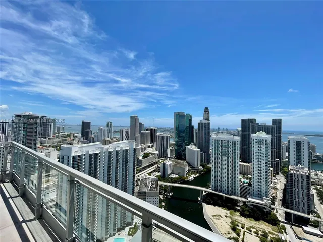 a view of a balcony with city view