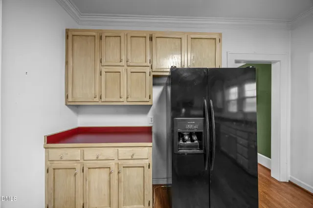 a kitchen with stainless steel appliances granite countertop a stove and a microwave