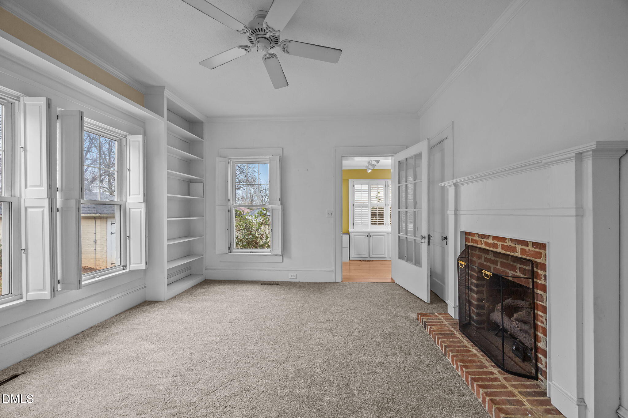 511 North Main Street Graham, NC 27253 - Photo 15 of 42 a view of empty room with windows and fireplace
