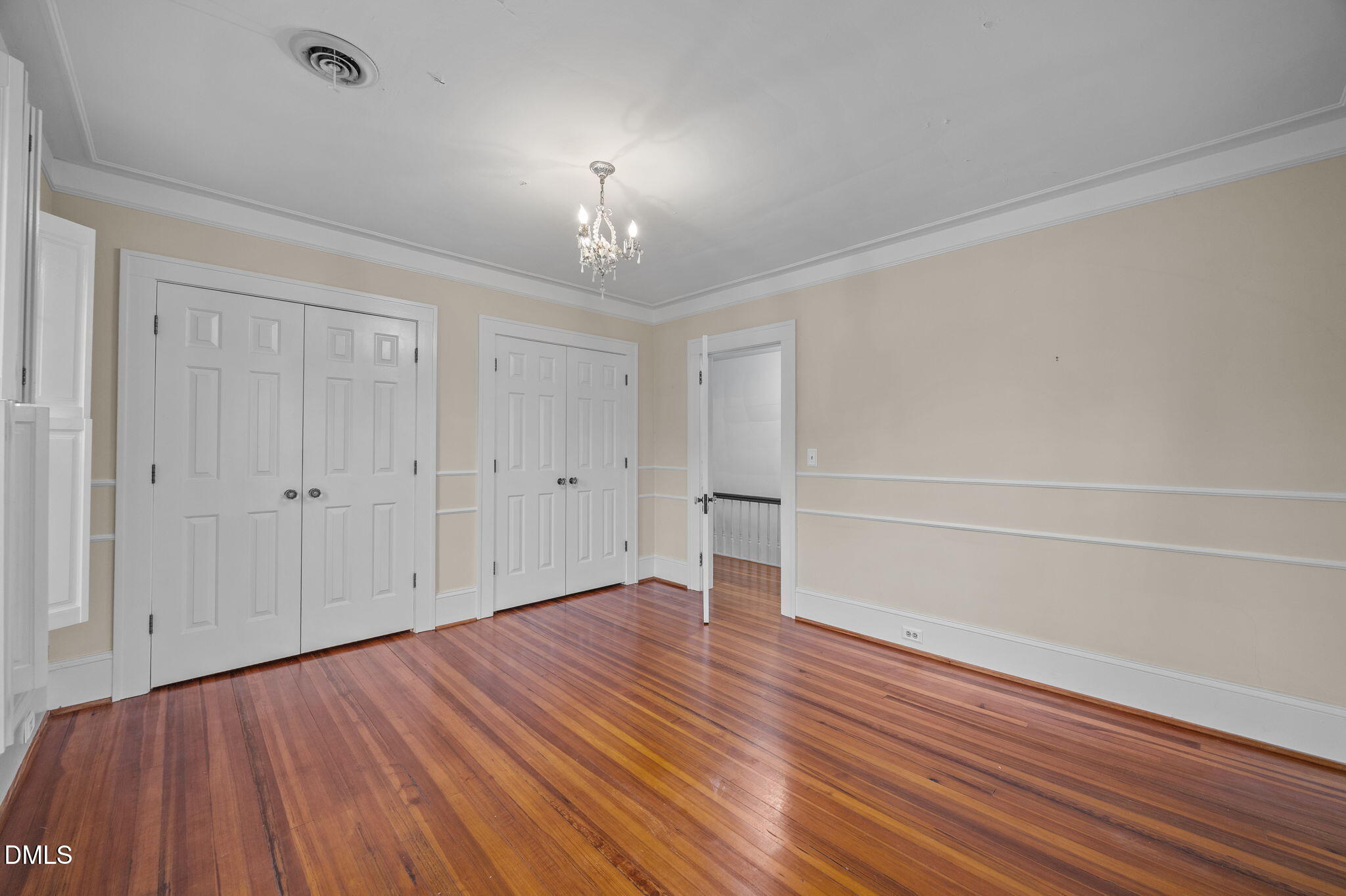 511 North Main Street Graham, NC 27253 - Photo 26 of 42 a view of empty room with wooden floor and fan