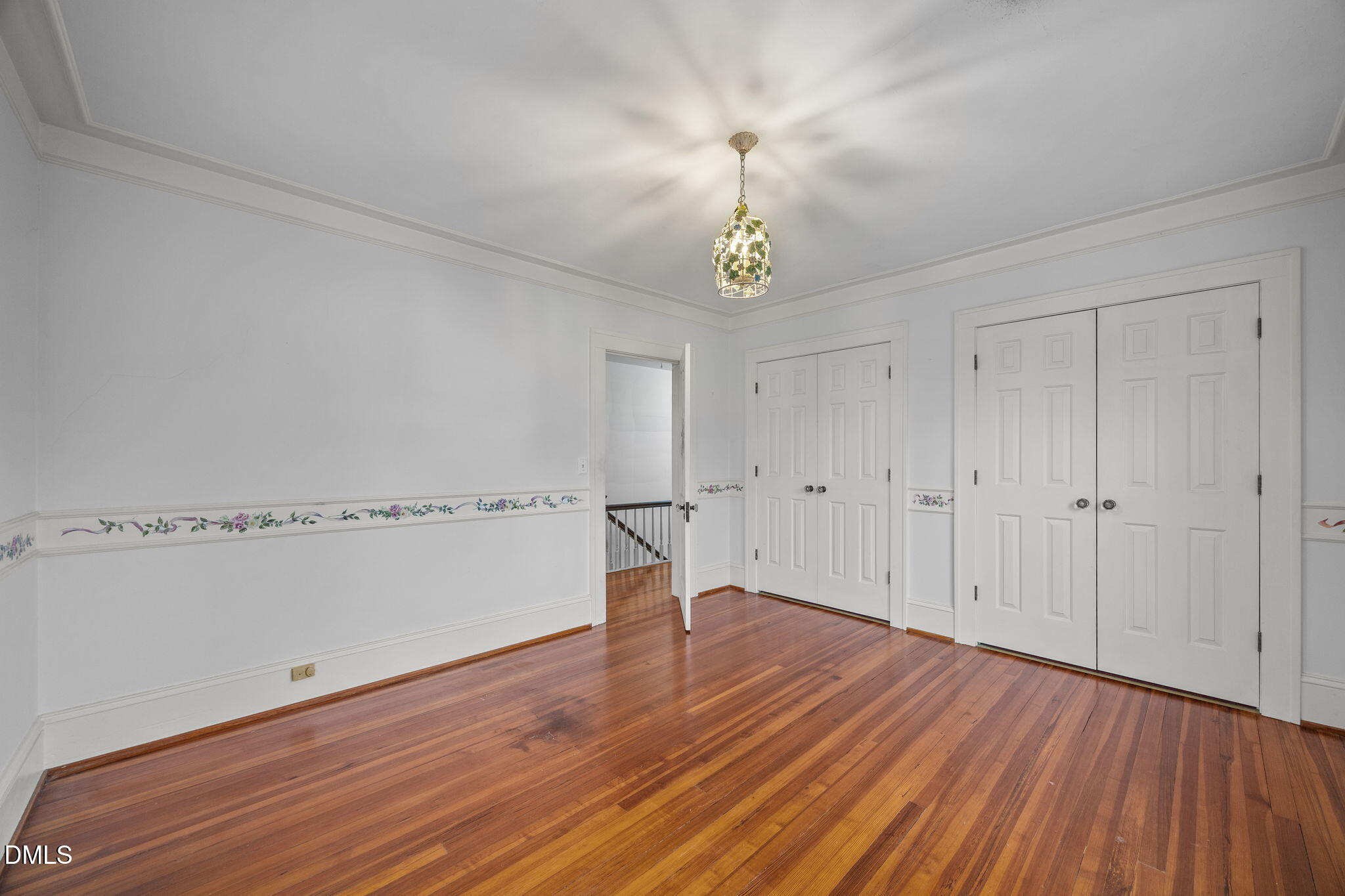 511 North Main Street Graham, NC 27253 - Photo 28 of 42 a view of empty room with wooden floor