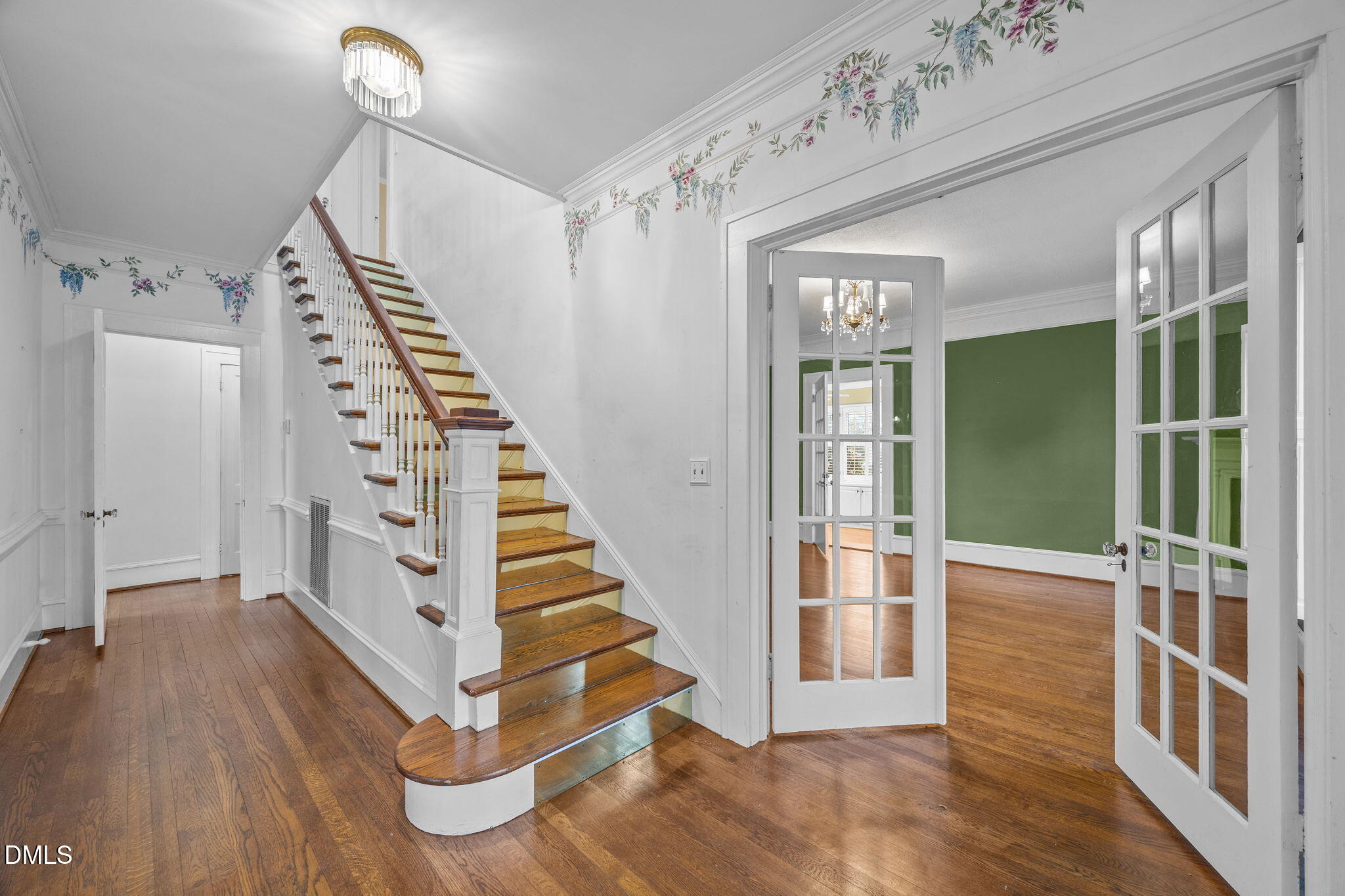 511 North Main Street Graham, NC 27253 - Photo 2 of 42 a view of entryway with stairs and wooden floor