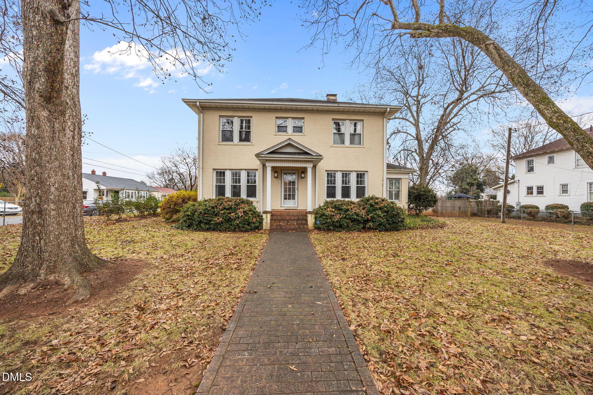 511 North Main Street Graham, NC 27253 - Photo 32 of 42 a front view of a house with a yard
