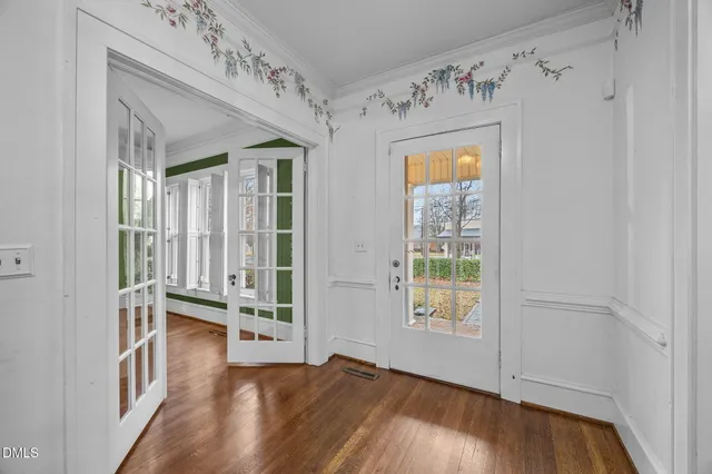 a view of entryway with wooden floor