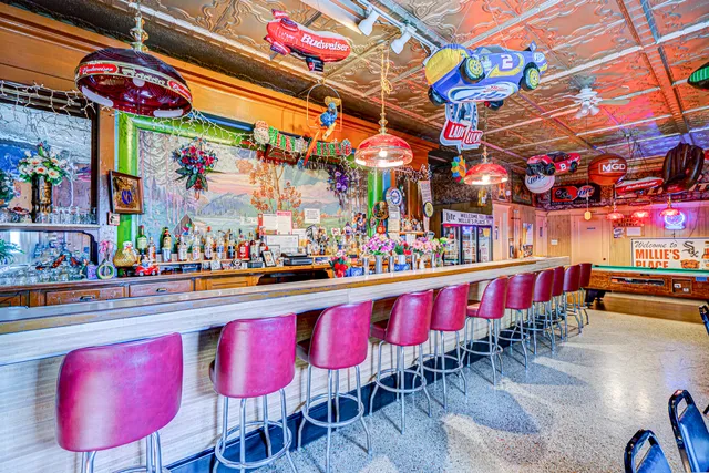 a view of room with wooden floor and ceiling fan