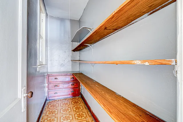 a kitchen with stainless steel appliances granite countertop a sink and a stove top oven