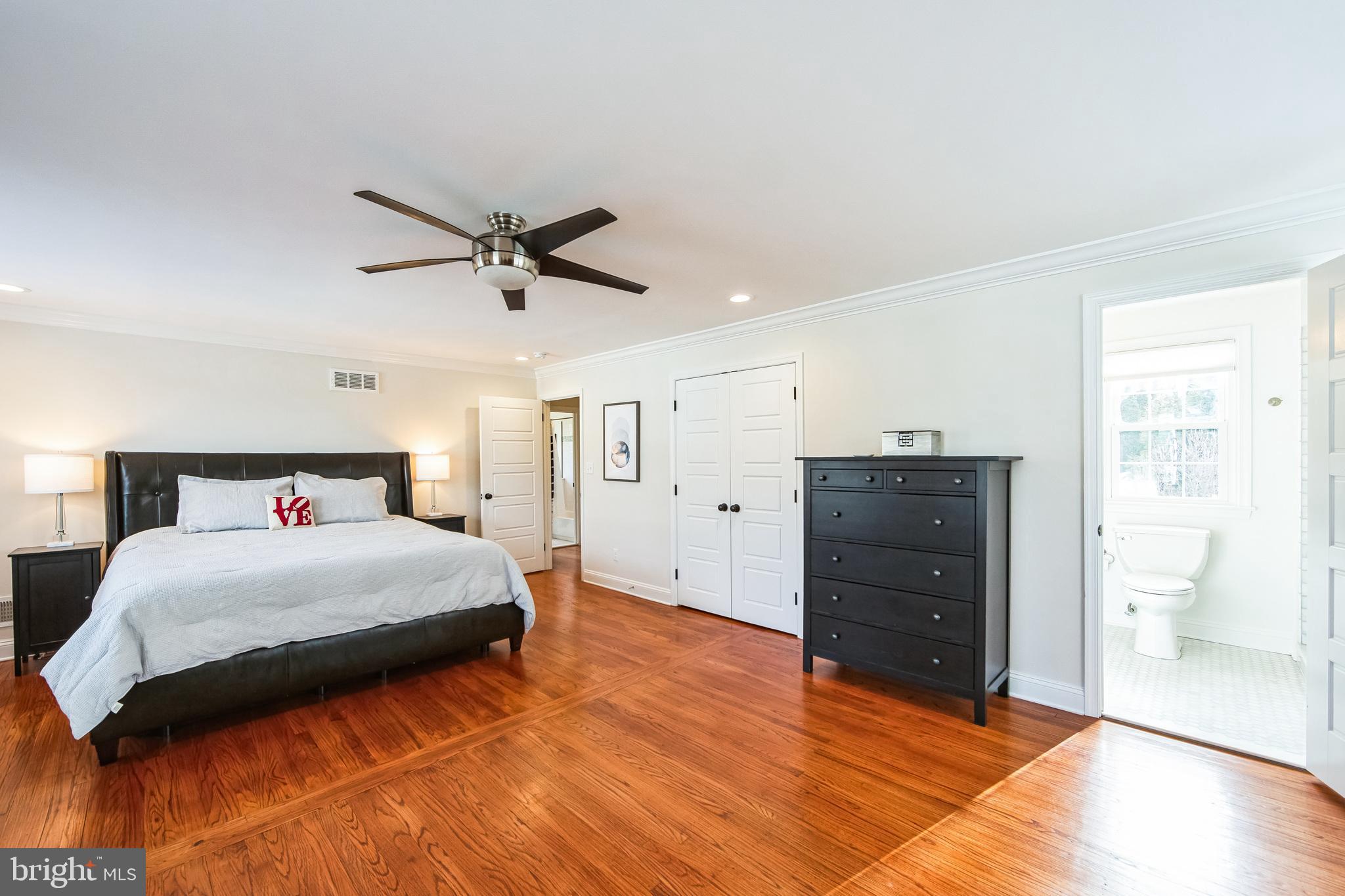 131 Clover Hill Lane Wayne, PA 19087 - Photo 21 of 50 a bedroom with a bed and a dresser