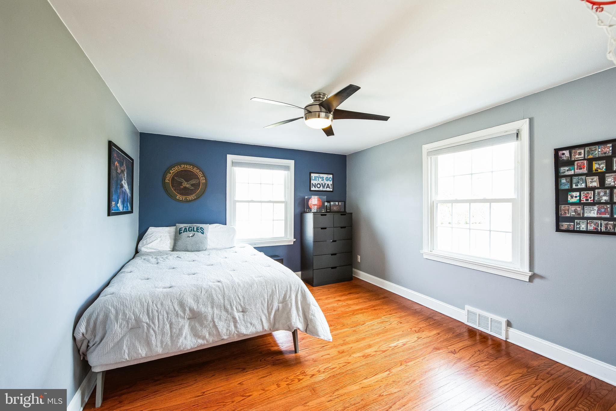 131 Clover Hill Lane Wayne, PA 19087 - Photo 25 of 50 a bedroom with a bed and dresser