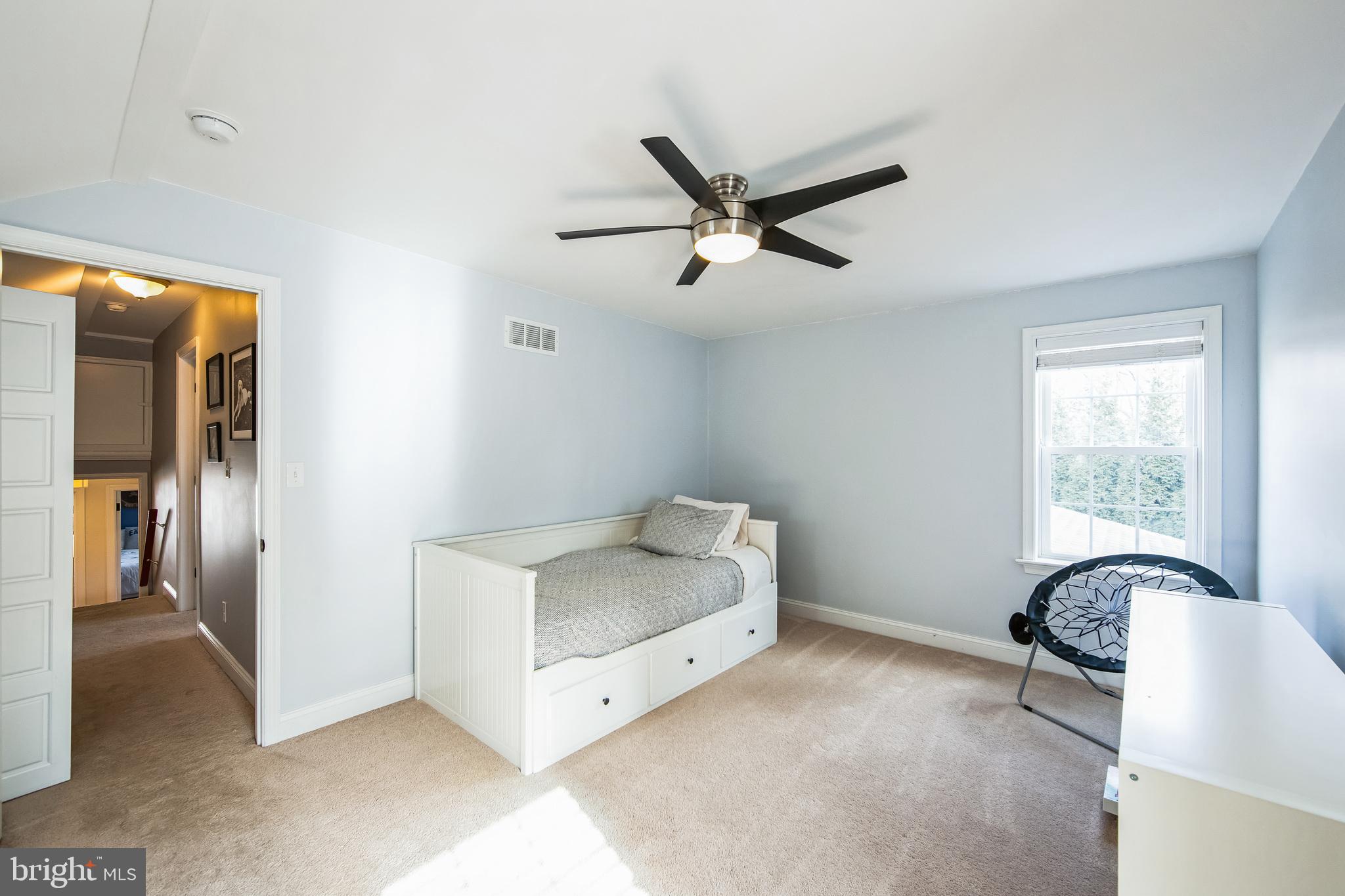 131 Clover Hill Lane Wayne, PA 19087 - Photo 29 of 50 a living room with furniture and a window