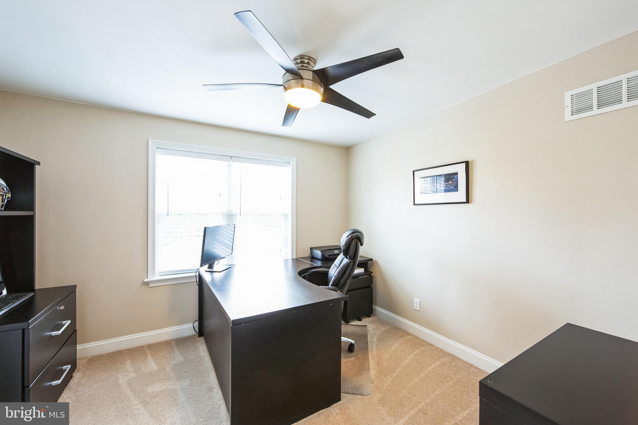 131 Clover Hill Lane Wayne, PA 19087 - Photo 33 of 50 a view of a workspace with furniture and a window