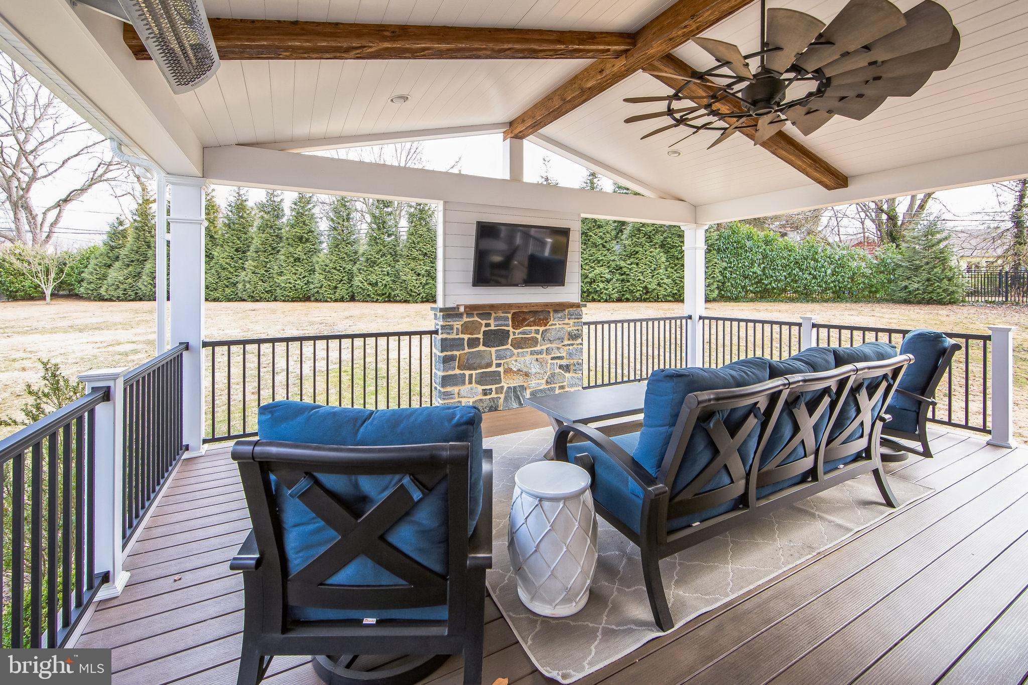 131 Clover Hill Lane Wayne, PA 19087 - Photo 35 of 50 a view of a balcony with furniture and wooden floor