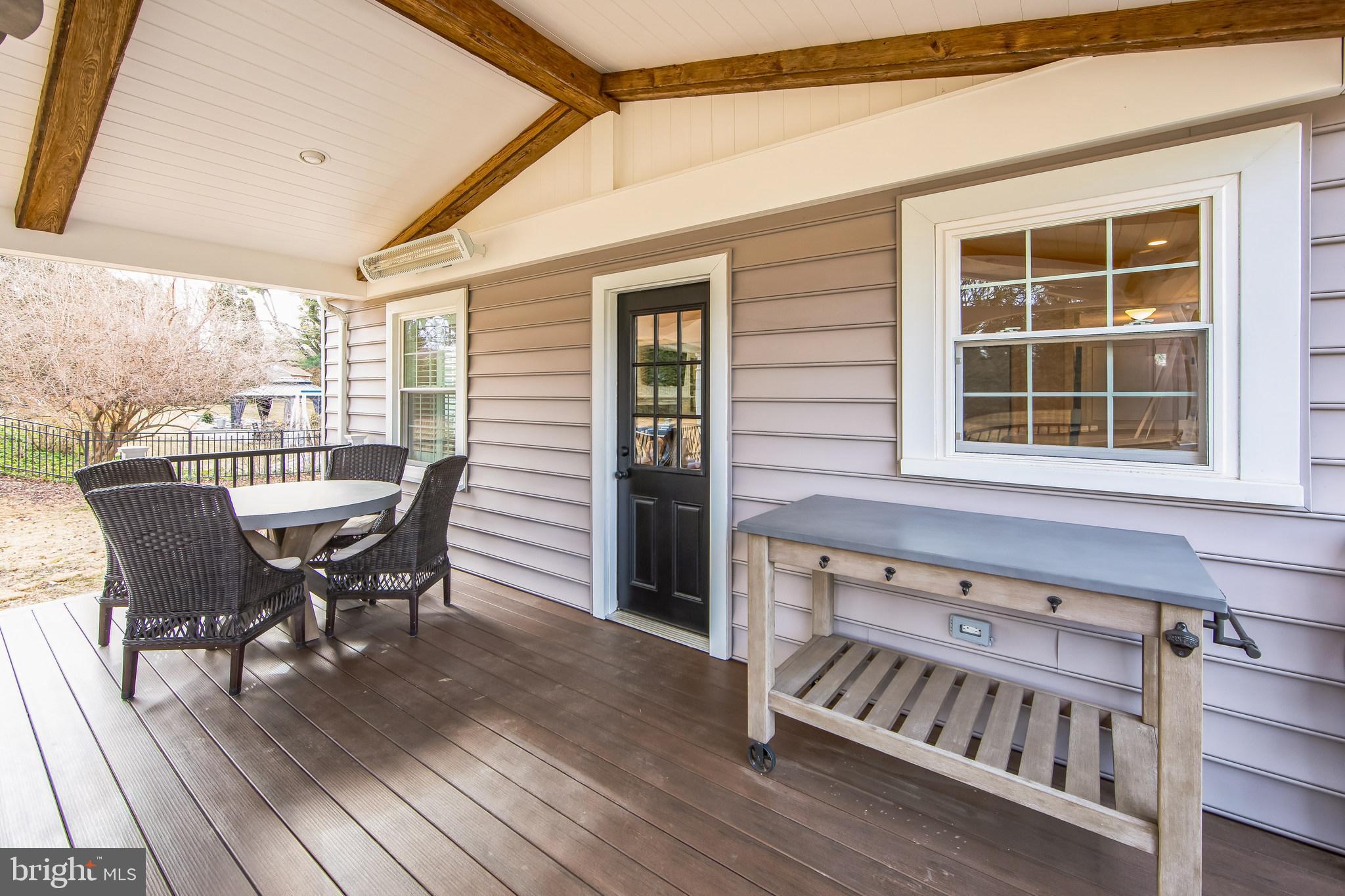131 Clover Hill Lane Wayne, PA 19087 - Photo 38 of 50 a view of a chair and table in the balcony