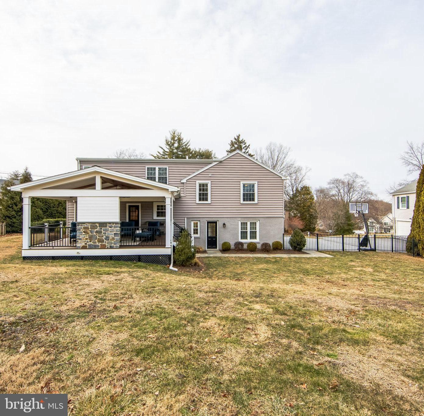 131 Clover Hill Lane Wayne, PA 19087 - Photo 39 of 50 a house view with a swimming pool