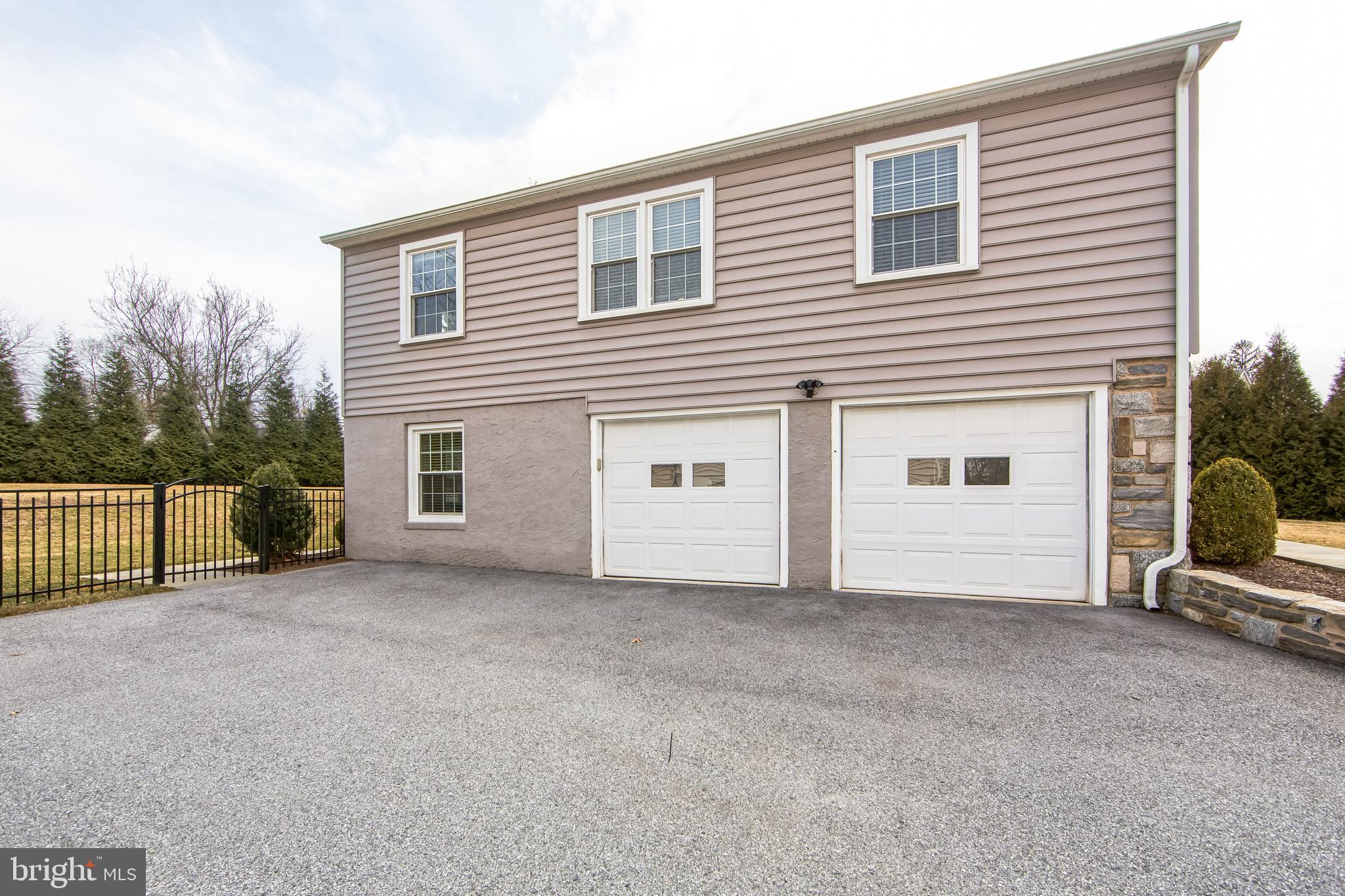 131 Clover Hill Lane Wayne, PA 19087 - Photo 43 of 50 a view of a house with a street
