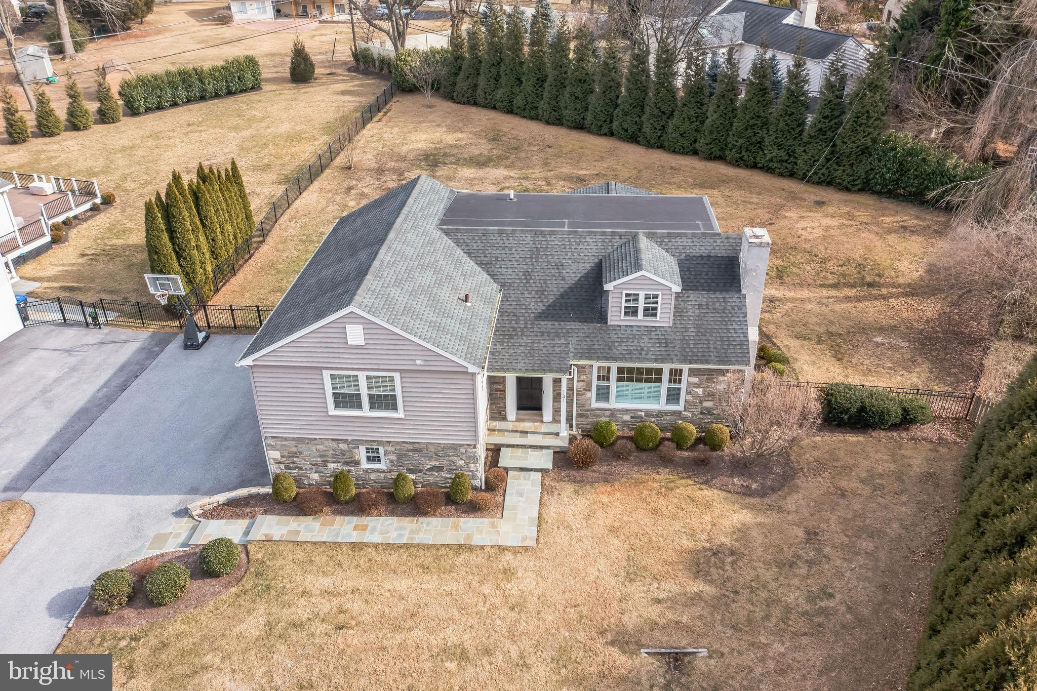 131 Clover Hill Lane Wayne, PA 19087 - Photo 44 of 50 a front view of a house with a yard