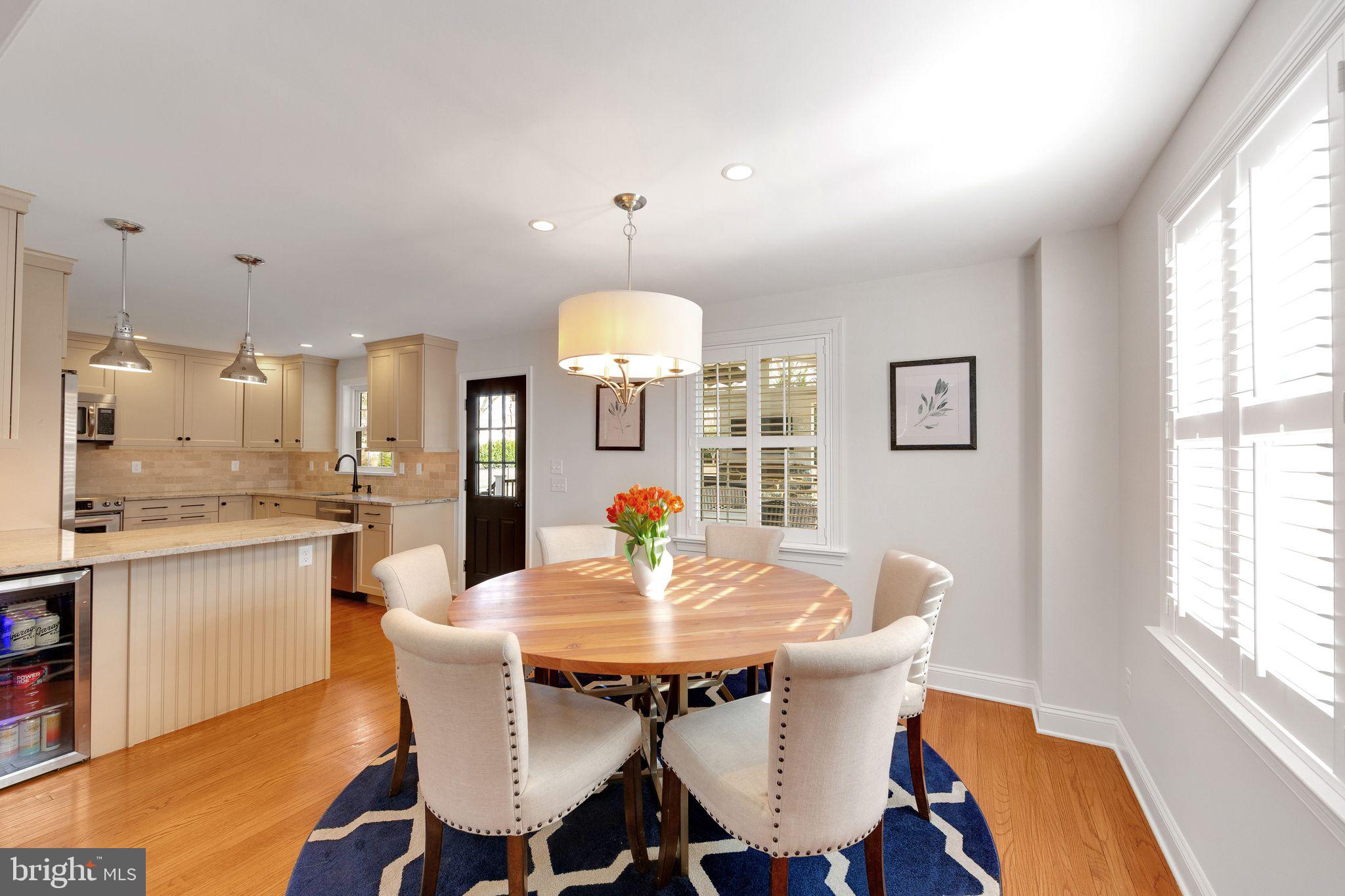 131 Clover Hill Lane Wayne, PA 19087 - Photo 7 of 50 a view of a dining room with furniture window and wooden floor